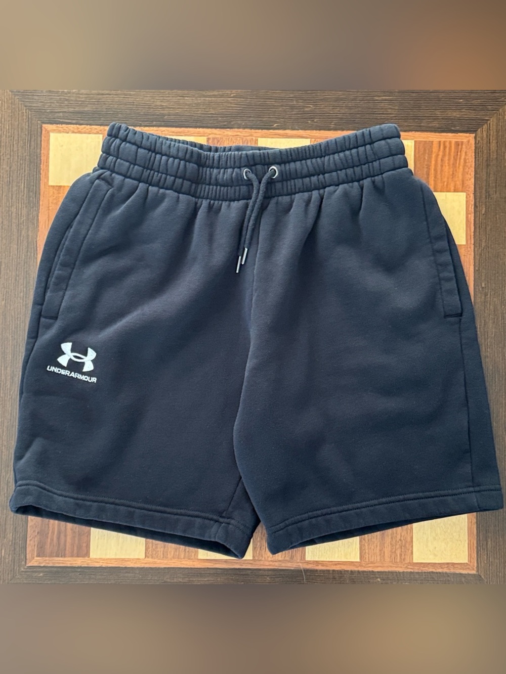 Under Armour mens black athletic shorts size small.